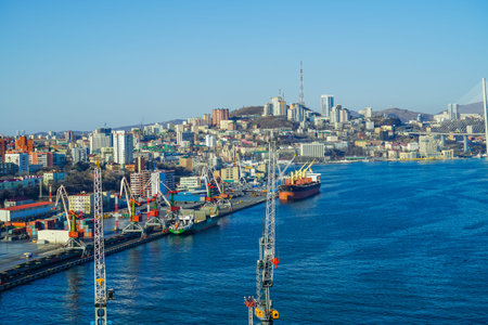 Vladivostok, Russia - April 12, 2020: Aerial overview of the Golden Horn Bay overlooking the seaport and ships.のeditorial素材