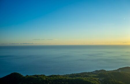 Panorama of the sea landscape with a green coastline.の写真素材