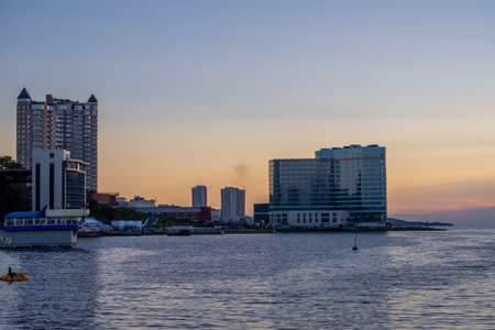 Vladivostok, Russia-September 30, 2018: Urban landscape with sea view at sunset.のeditorial素材