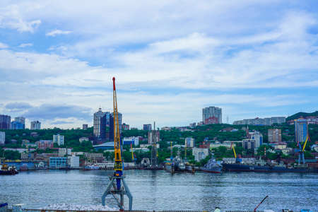 Vladivostok, Russia-June 6, 2020: Industrial landscape with a port and cranes in the Golden horn Bayのeditorial素材
