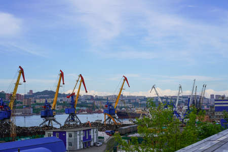 Vladivostok, Russia-June 6, 2020: Industrial landscape with a port and cranes in the Golden horn Bayのeditorial素材