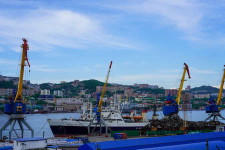 Vladivostok, Russia-June 6, 2020: Industrial landscape with a port and cranes in the Golden horn Bayのeditorial素材