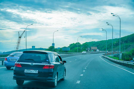Vladivostok, Russia-June 6, 2020: Urban landscape with a view of the road.のeditorial素材