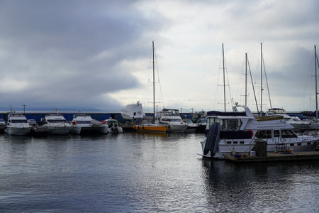 Vladivostok, Russia-July 6, 2020: Urban landscape with yacht Parking on the sea.のeditorial素材