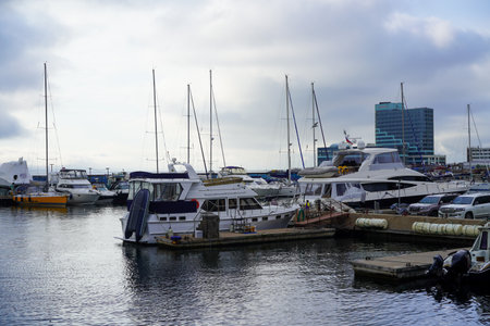 Vladivostok, Russia-July 6, 2020: Urban landscape with yacht Parking on the sea.のeditorial素材