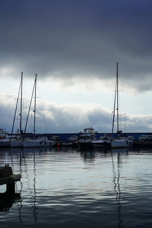 Vladivostok, Russia-July 6, 2020: Urban landscape with yacht Parking on the sea.のeditorial素材