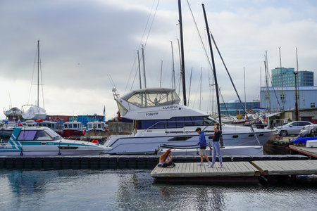 Vladivostok, Russia-July 6, 2020: Urban landscape with yacht Parking on the sea.のeditorial素材