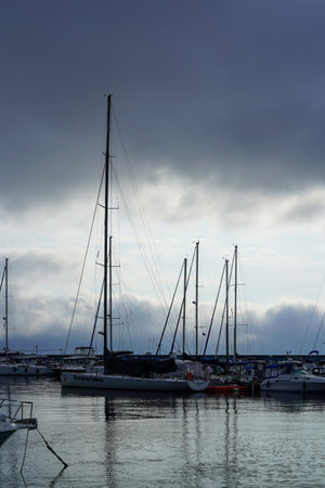 Vladivostok, Russia-July 5, 2020: Urban landscape with yacht Parking on the sea.のeditorial素材
