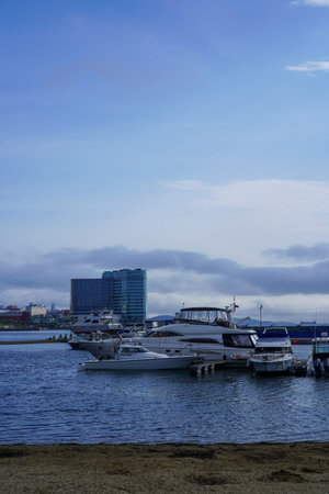Vladivostok, Russia-July 6, 2020: Urban landscape with views of the yacht Park and housesのeditorial素材