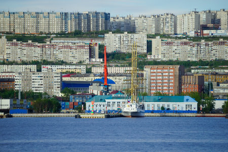 Murmansk, Russia-June 5, 2015: Ship in the Kola Bay on the background of the city.のeditorial素材