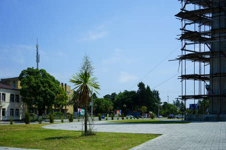 Ochamchira, Abkhazia-July 26, 2015: Urban landscape with a view of the monument.のeditorial素材