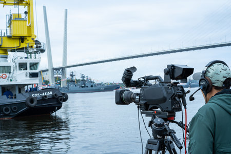 Vladivostok, Russia - July 26, 2020: Videographer on the Tsesarevich's embankment.のeditorial素材