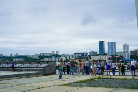 Vladivostok, Russia - July 26, 2020: Urban landscape with people on the view of the city.のeditorial素材
