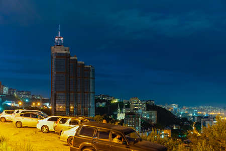 Vladivostok, Russia - July 27, 2020: Night landscape with views of the city and cars.のeditorial素材