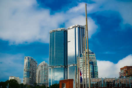 Vladivostok, Russia-July 6, 2020: Urban landscape with buildings against the sky.のeditorial素材