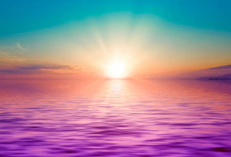 Fantastic seascape with beautiful purple sea at sunset.の写真素材