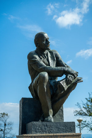 Nakhodka, Primorsky Krai - September 26, 2020: City skyline with views of the sculpture against the blue sky.のeditorial素材