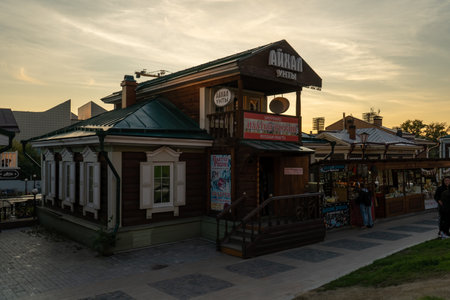 Irkutsk, Russia-September 18, 2020: Urban landscape with views of wooden houses on a pedestrian street.のeditorial素材