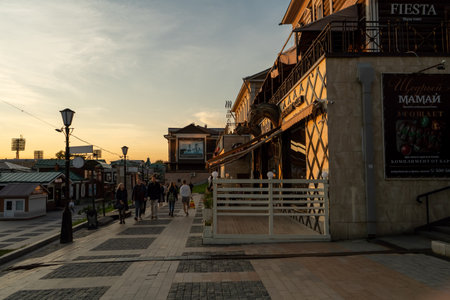 Irkutsk, Russia-September 18, 2020: Urban landscape with views of wooden houses on a pedestrian street.のeditorial素材