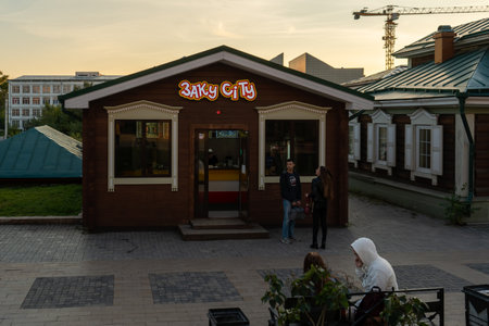 Irkutsk, Russia-September 18, 2020: Urban landscape with views of wooden houses on a pedestrian street.のeditorial素材