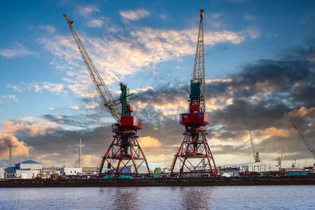 Kaliningrad, Russia. Port of a large Russian city with ships and various equipment on the background of the river.の写真素材