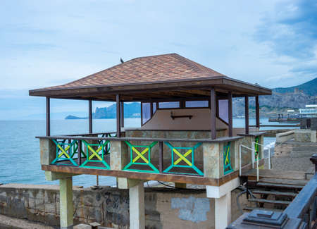 Seascape with a view of the Sudak embankment. Crimeaのeditorial素材