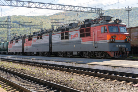 Slyudyanka, Irkutsk region-September 16, 2020: Industrial landscape with train and railway viewsのeditorial素材