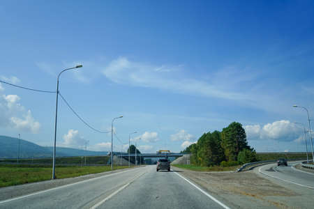 IRKUTSK, RUSSIA-SEPTEMBER 16, 2020: Urban landscape with a view of the road and cars.のeditorial素材