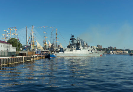 Vladivostok, Russia. Warships and sailboats in the port of the city.のeditorial素材