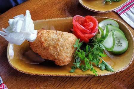 Cutlets in Kiev on a wooden table. National cuisineの写真素材
