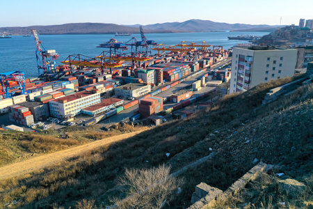 Vladivostok, Russia-April 12, 2020: Industrial landscape with a view of the commercial port on the...
