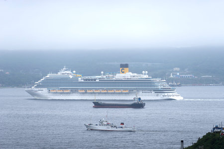 VLADIVOSTOK, RUSSIA-SEPTEMBER 7, 2019: Seascape in a large cruise ship in cloudy weather.