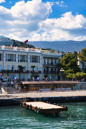 Yalta, Crimea-June 11, 2021: Urban landscape with a view of the embankment.のeditorial素材