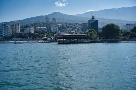 Yalta, Crimea-June 11, 2021: Seascape with a view of the coastline of the cityのeditorial素材