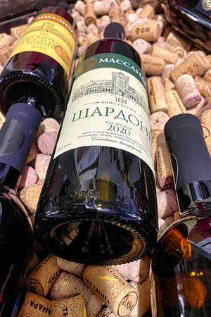 MASSANDRA, CRIMEA-June 10, 2021: Glass bottle with wine close-upのeditorial素材