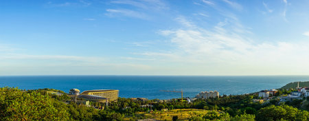 Panorama of the natural landscape with a view of the sea and architecture. Ponizovka Crimea