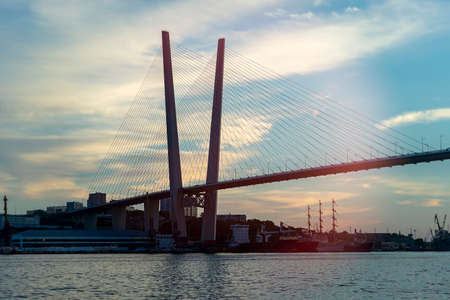 Urban landscape with a view of the Golden Bridge. Vladivostok, Russiaの写真素材