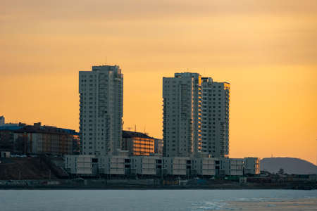 Vladivostok, Russia. Urban landscape on the background of sunset.の写真素材