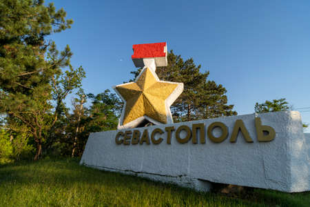 Sevastopol, Russia-June 21, 2021: Monument with the inscription Sevastopol on the background of nature.のeditorial素材