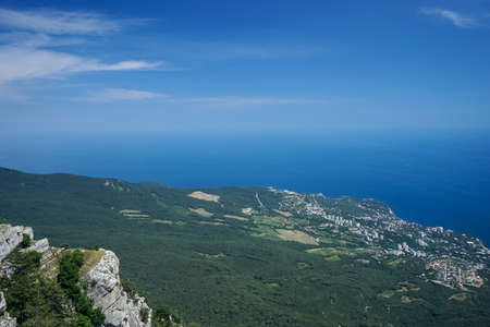 Landscape with a view from a height to the coastline of Yalta, Crimeaの写真素材