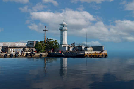 Seascape with a view of the white lighthouse. Yalta, Crimeaの写真素材