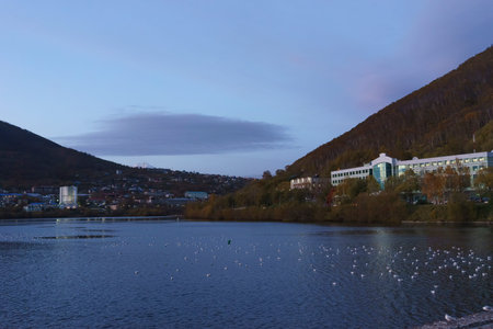 Urban landscape with lake and mountain views. Petropavlovsk-Kamchatsky, Russia