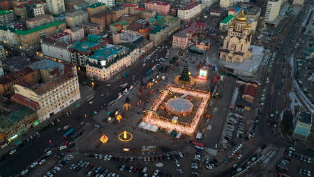 Vladivostok, Russia - January 7, 2022: City landscape with a view of the square with a Christmas tree.のeditorial素材