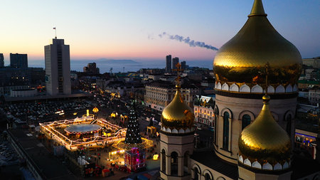 Vladivostok, Russia - January 7, 2022: City landscape with a view of the square with a Christmas tree.のeditorial素材