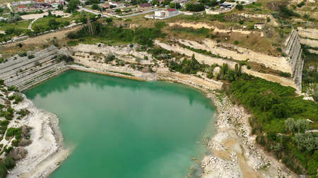 A quarry with a lake in a quarry for the extraction of white limestone. Inkerman. Crimea.の写真素材