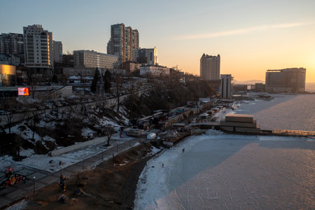 Vladivostok, Russia - January 7, 2022: Aerial view of the urban landscape with a view of the embankment near the Amur Bay.のeditorial素材
