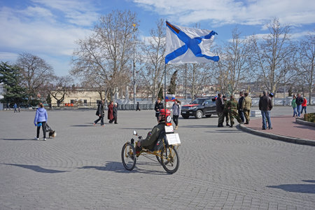 Sevastopol, CRIMEA - March 16, 2015: Nakhimov Square with people on holiday.のeditorial素材