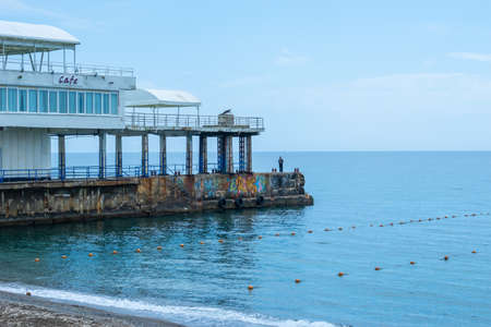 Sudak, Crimea-May 20, 2018: Urban landscape with a view of the embankment and people.のeditorial素材