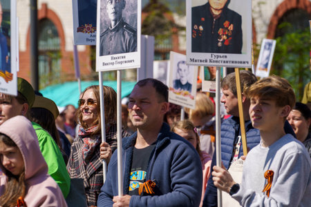 Vladivostok, Russia - May 9, 2022: Passage of the Column of the Immortal Regiment on Svetlanskaya Streetのeditorial素材