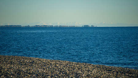 Seascape with mountains on the horizon. Sukhumi, Abkhaziaの写真素材